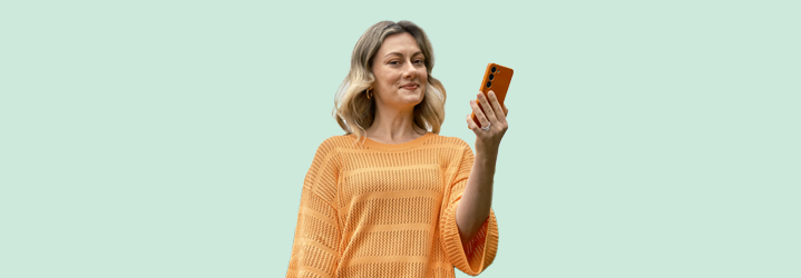 Lady holding an orange phone